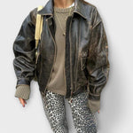 Leopard print vintage jeans with slim tapered legs and front pockets