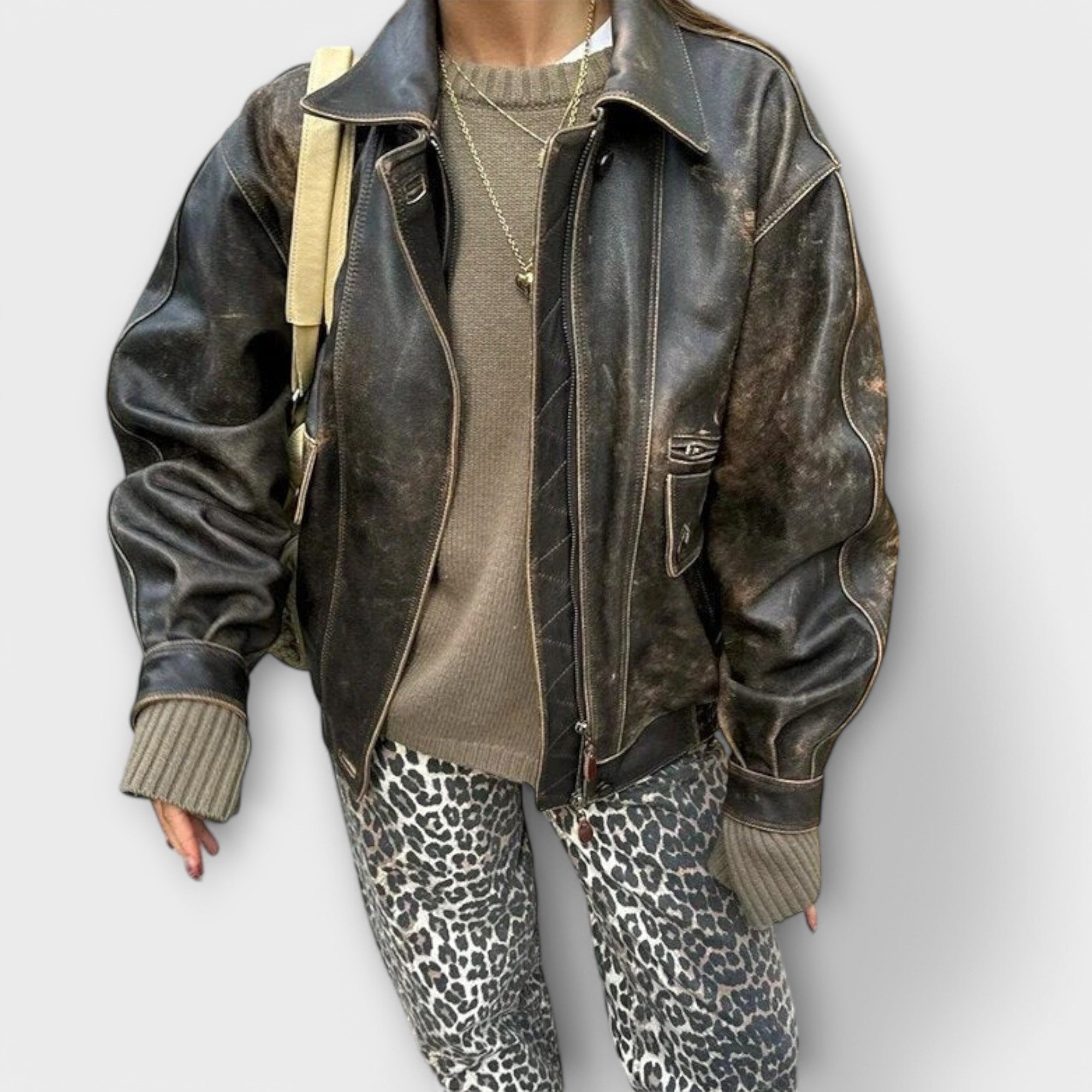 Leopard print vintage jeans with slim tapered legs and front pockets