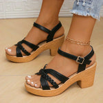Kleoniki black platform heeled sandals with crisscross strap and ankle buckle