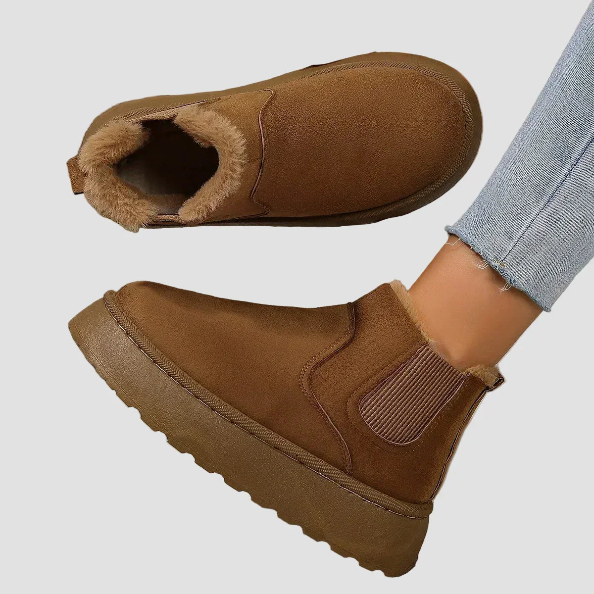Brown winter ankle boots with fur lining and elastic side panels