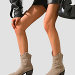 Beige western embroidered ankle boots with pull tabs and low stacked heel