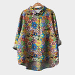 Floral button-up blouse with long sleeves and collar