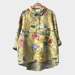 Premium floral-print button-up blouse with collar, long sleeves, and patch pockets