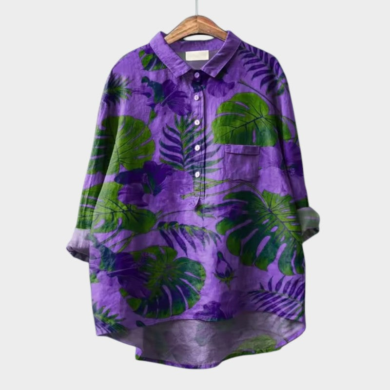 Tropical-print button-up blouse with front pocket, long sleeves and collar