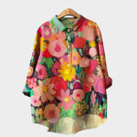 Floral printed long-sleeve button-up blouse with green lace-trim collar