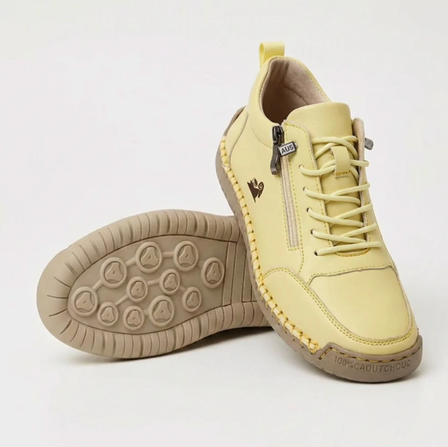 Yellow sport orthopedic sneaker with lace-up, side zipper, and grippy beige outsole.