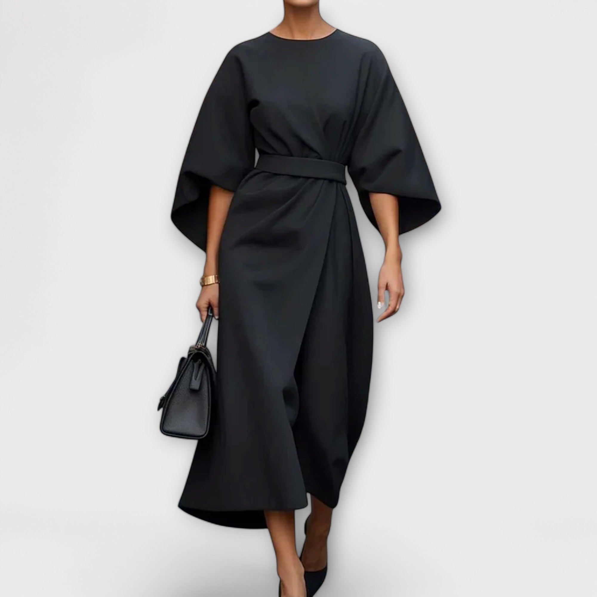 Black satin midi dress with wide batwing sleeves and waist belt, crossover drape.