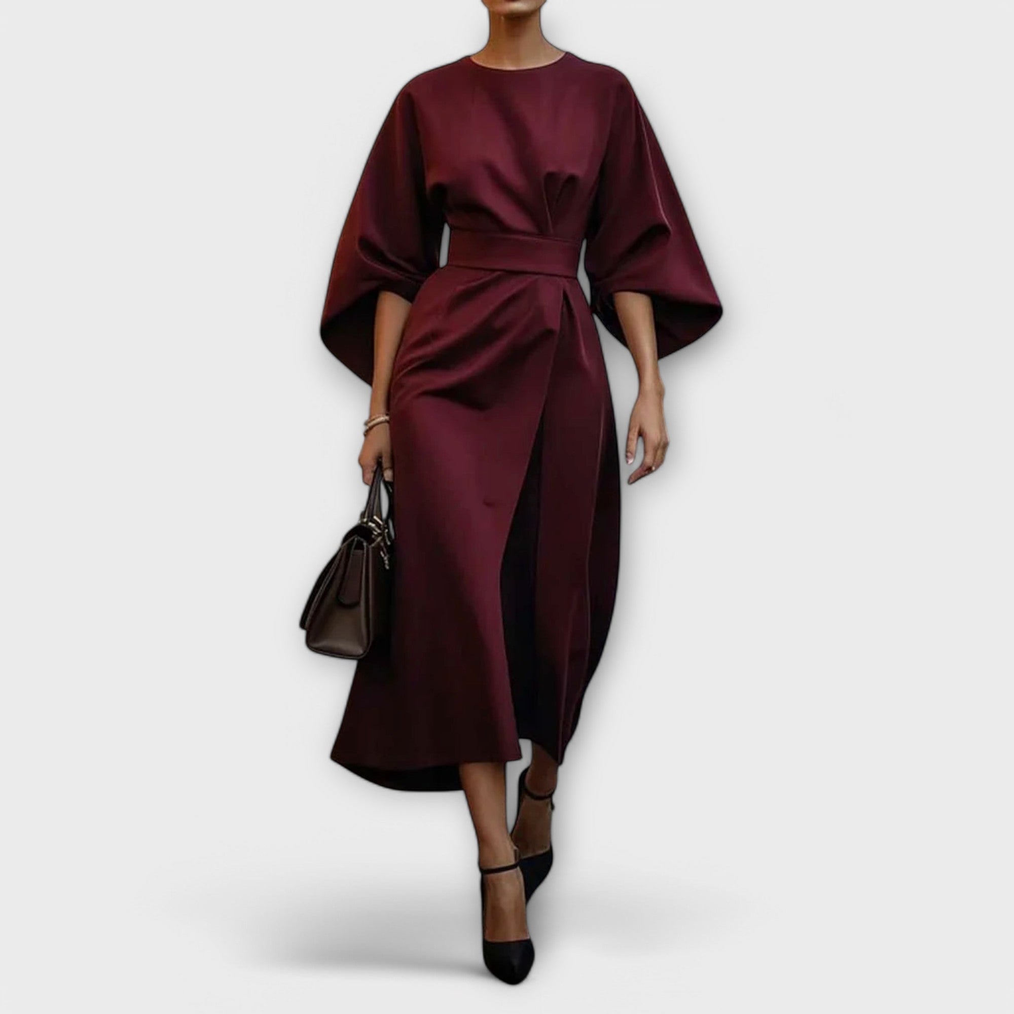Burgundy satin midi dress with wide batwing sleeves and waist belt, twisted wrap front.