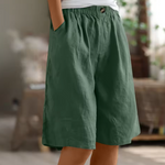 Cotton comfort shorts, deep green, elastic waist and front button detail