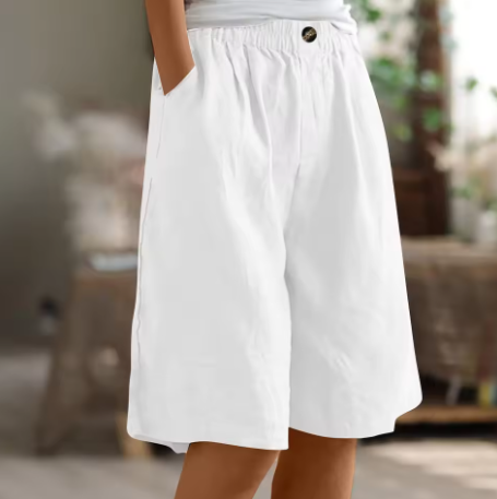 Cotton casual shorts with elastic waist, white color, button detail, loose fit