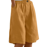 Cotton casual shorts with elastic waist, mustard color, button detail, loose fit