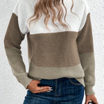 Color-block knit sweater, crew neck, long sleeves; white, tan-beige, and brown panels.