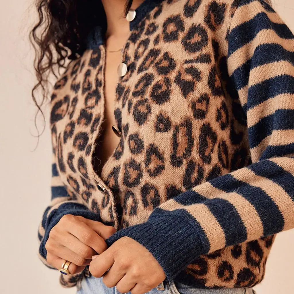 Leopard print knit cardigan with navy-striped sleeves and button front