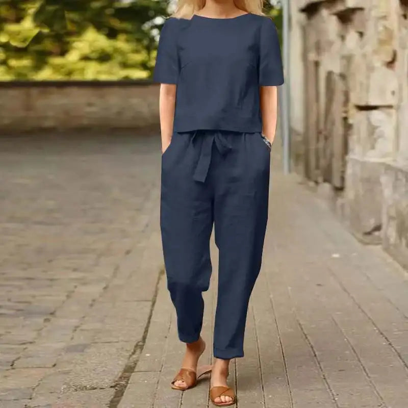 Lili linen two-piece set in navy: short-sleeve top with tied waist and cropped tapered pants