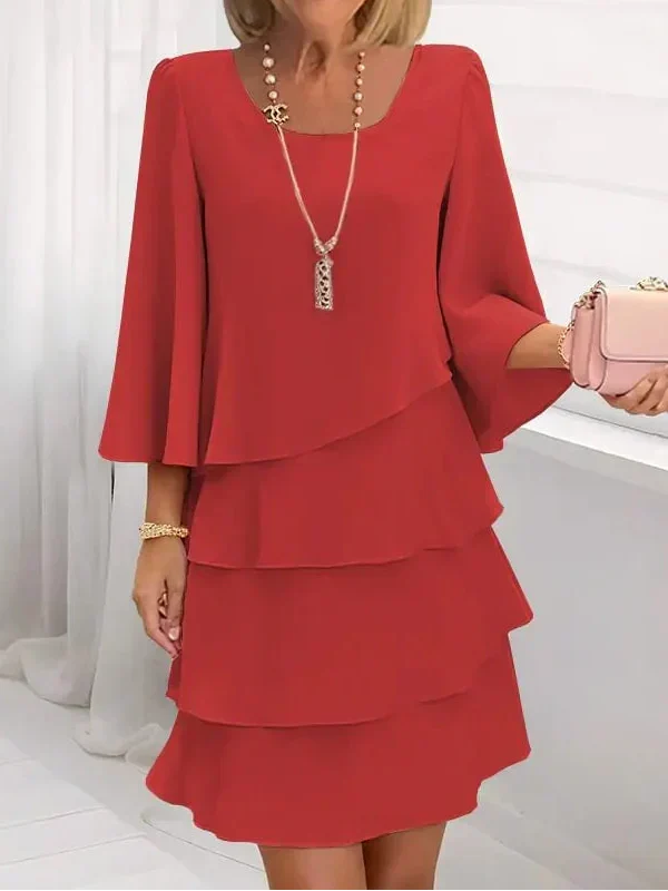 Beige layered ruffle shift dress with draped scoop neckline and tiered skirt