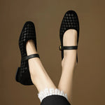 Black woven leather Mary Jane sandals with ankle strap and gold-tone buckle