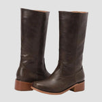 Dark brown tall pull-on equestrian boots with block heel and stitched goring