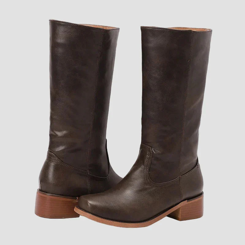 Dark brown tall pull-on equestrian boots with block heel and stitched goring