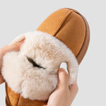 Georgia suede home slippers in tan with white faux-fur strap, shown close-up