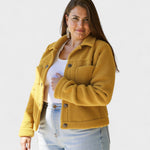 Yellow button-front fleece jacket with flap chest pockets and long sleeves
