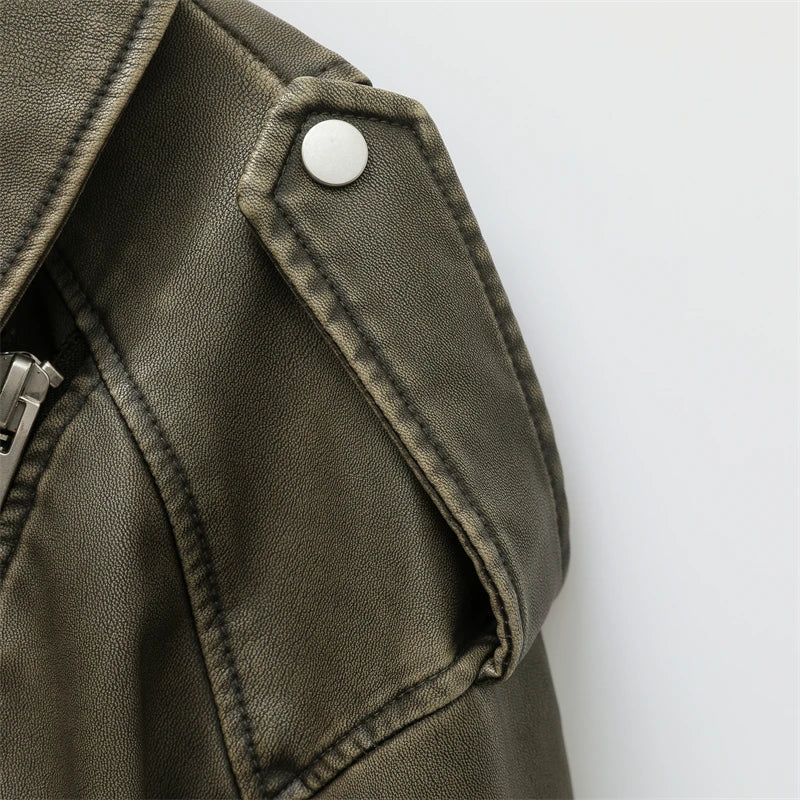 Élodie™ trendy jacket in dark green faux leather with snap shoulder detail