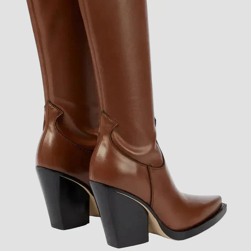 Brown knee-high heeled boots with decorative seam at vamp and thick block heel