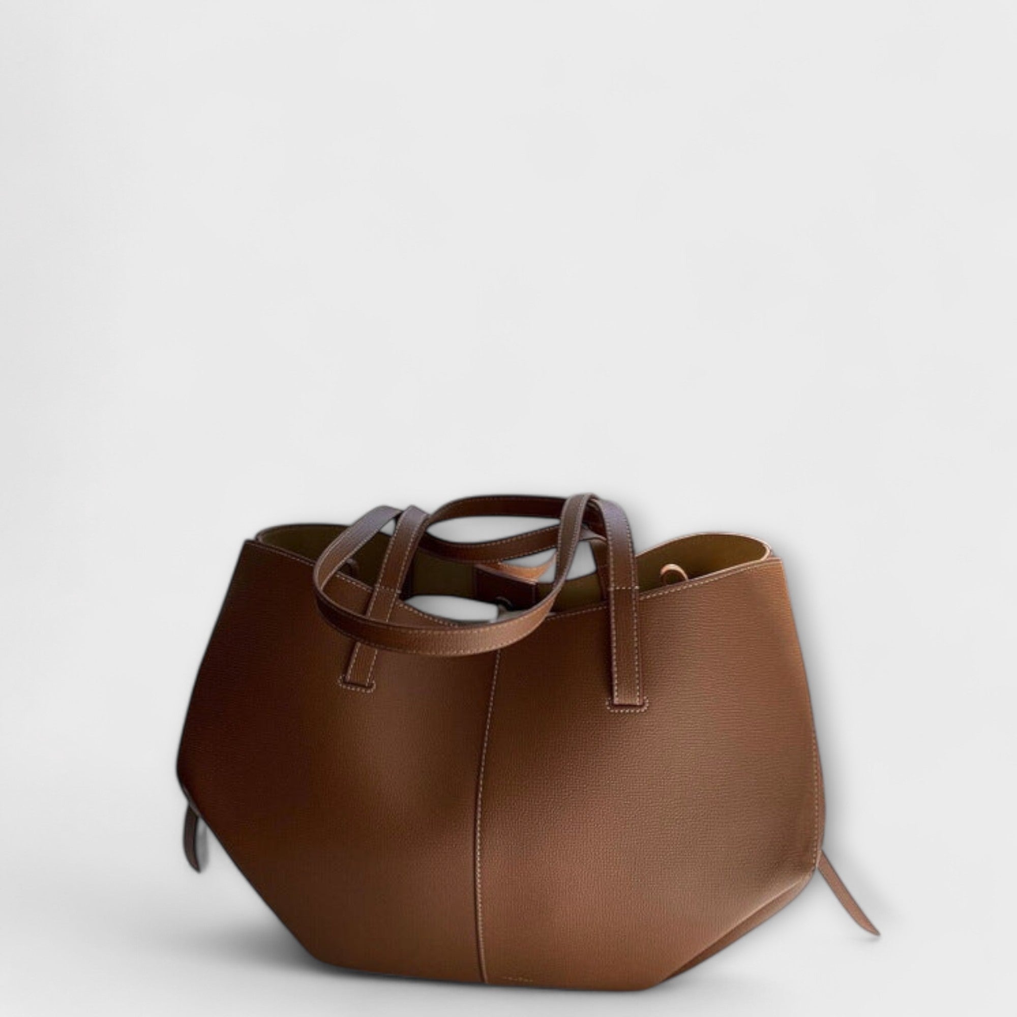 Brown leather-look hobo tote bag with top handles and long tie straps