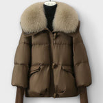 Taupe puffer jacket with faux fur collar, zip front, flap pockets.