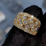 Gold-tone statement ring with square lattice and clear gemstones
