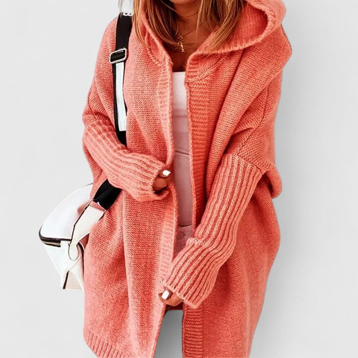 Coral pink hooded long cardigan with chunky knit, ribbed cuffs and buttoned placket