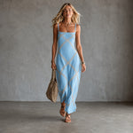 Light blue maxi dress with geometric lattice print in gold tones, spaghetti straps