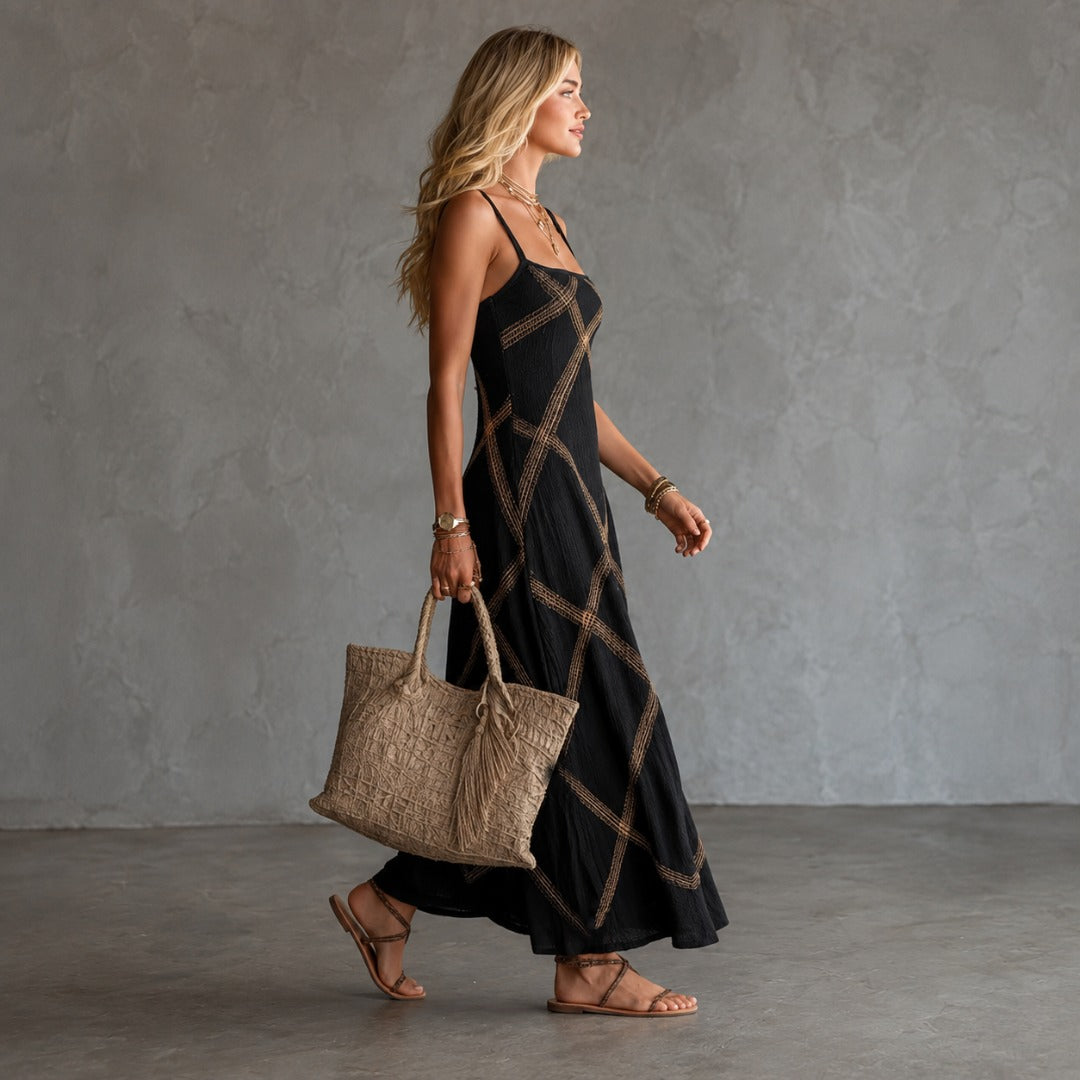 Black geometric lattice maxi dress with spaghetti straps, side view