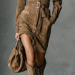 Brown suede midi dress with long sleeves, button front, and side drape belt
