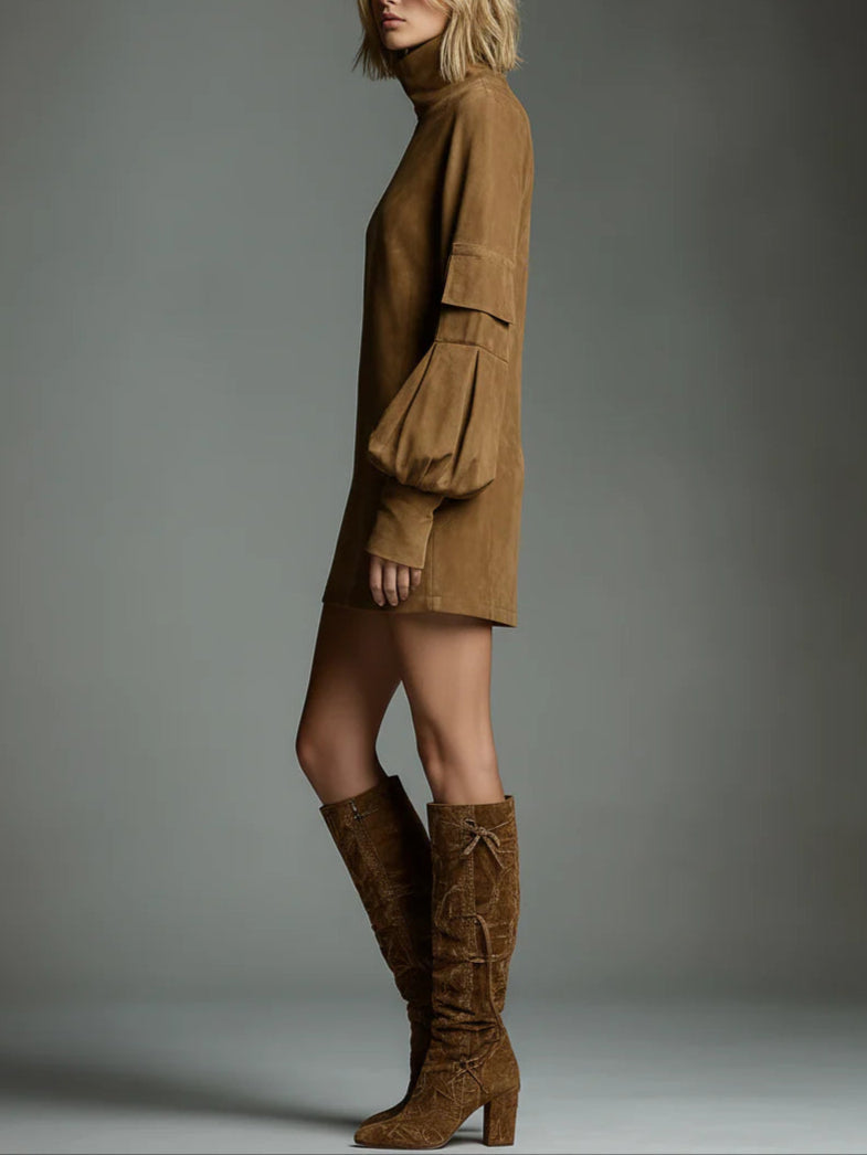 Brown oversized mini sweatshirt dress in profile, high neck and sleeve pocket