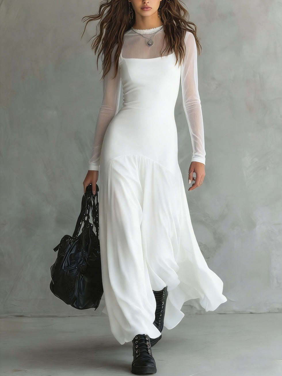 Long white dress with sheer long sleeves and flowing layered skirt