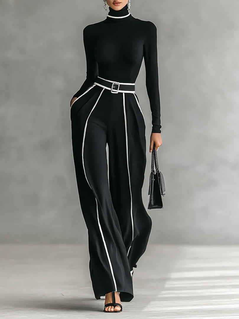 Black mock-neck top and wide-leg pants set with white vertical piping and belt
