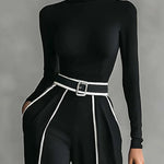 Black mock-neck top with long sleeves and wide-leg pants, white piping belt detail