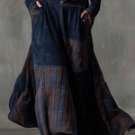 Navy suede-look maxi dress hem detail with layered plaid patchwork panels