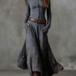Gray suede-look maxi dress with front buttons, wide leather belt, and plaid patchwork panels