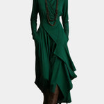 Asymmetric long dress, green, long sleeves, high neck, draped wrap front and layered skirt