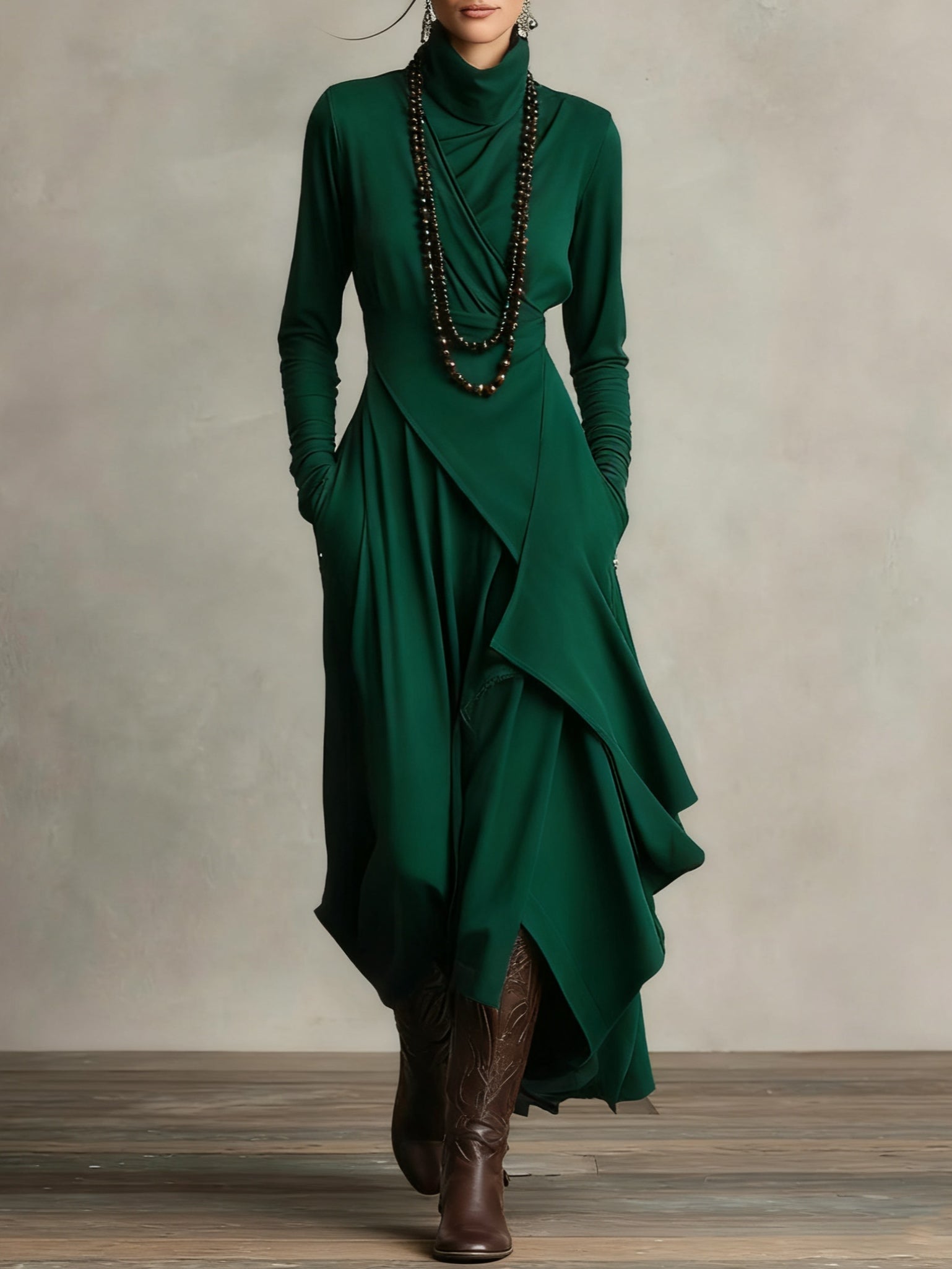 Dark green asymmetrical wrap leggings with layered front drape