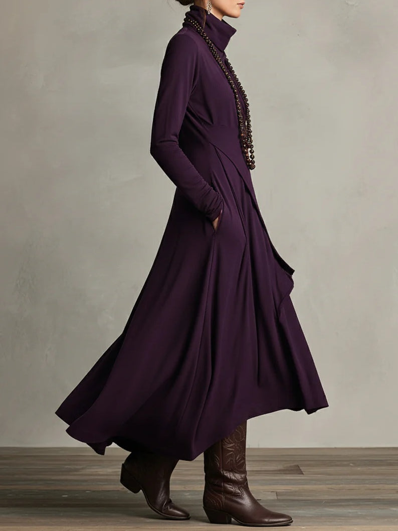 Side view of purple asymmetric draped long dress with cowl neck and long sleeves