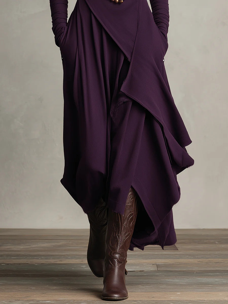 Purple asymmetric draped long dress hem detail with layered panels and long sleeves