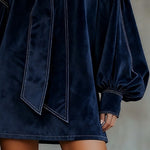 Blue velvet mini dress hem with stitched panel, long cuffed puff sleeves