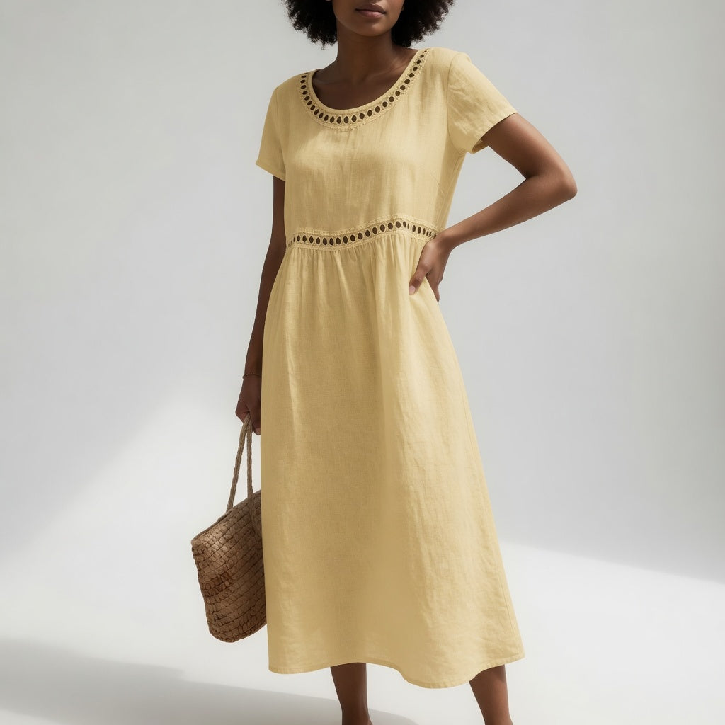 Yellow embroidered midi dress with round eyelet-trim neckline and short sleeves