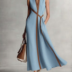 Elira linen dress in light blue with deep V-neck and diagonal tie panel, sleeveless maxi
