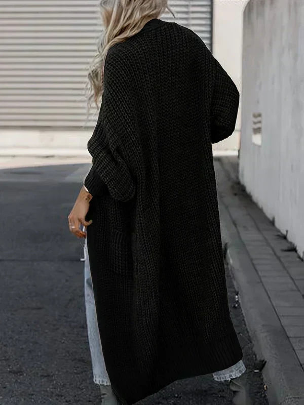 Black long knit cardigan with ribbed cuffs and buttonless open front