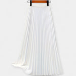 Long pleated satin skirt, white with elastic waistband and flowing A-line drape.