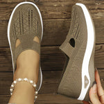 Beige orthopedic knit slip-on sneakers with breathable cutouts and white rubber sole