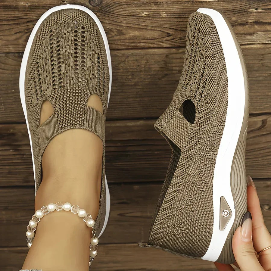 Beige orthopedic knit slip-on sneakers with breathable cutouts and white rubber sole